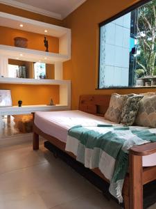 Postel nebo postele na pokoji v ubytování Casa de temporada