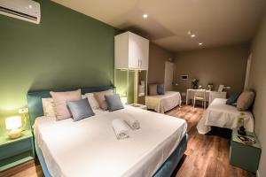 Voodi või voodid majutusasutuse Baitan Hotel toas