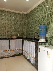 Kuchyň nebo kuchyňský kout v ubytování Casa de temporada