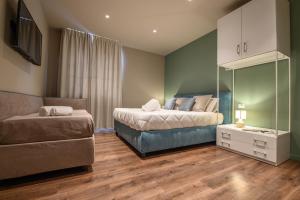 Voodi või voodid majutusasutuse Baitan Hotel toas