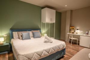 Voodi või voodid majutusasutuse Baitan Hotel toas