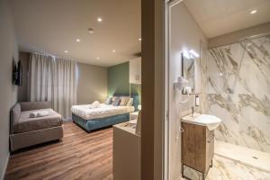 Voodi või voodid majutusasutuse Baitan Hotel toas