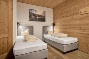 Postel nebo postele na pokoji v ubytování AREA 47 - Tirol