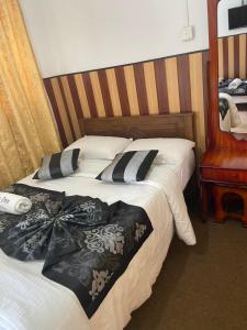 Postel nebo postele na pokoji v ubytování New Happy inn