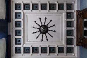 a wall with a picture of a spider on it at The Benjamin House in Rīga