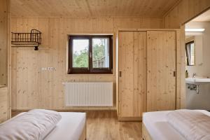 Postel nebo postele na pokoji v ubytování AREA 47 - Tirol