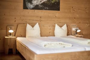 Postel nebo postele na pokoji v ubytování AREA 47 - Tirol