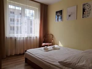 Postel nebo postele na pokoji v ubytování Willa Magdalena