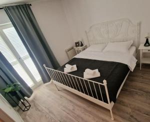 Postel nebo postele na pokoji v ubytování Apartments Lukas