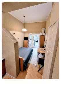 Кухня или мини-кухня в Ievos Kalno apartamentai III
