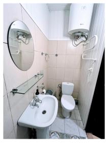 Ванная комната в Ievos Kalno apartamentai III