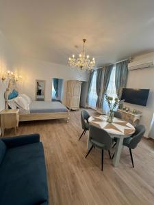 Ένα ή περισσότερα κρεβάτια σε δωμάτιο στο Appartement du Cloitre 1er