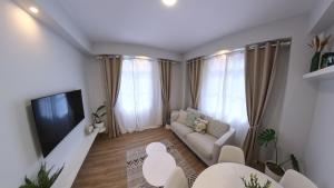 TV a/nebo společenská místnost v ubytování Machico Heart Suites