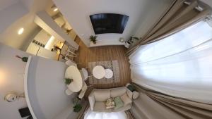 TV a/nebo společenská místnost v ubytování Machico Heart Suites