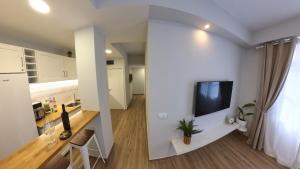 Kuchyň nebo kuchyňský kout v ubytování Machico Heart Suites