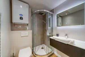 Ένα μπάνιο στο R'Apparts Studio Le Luxury N3