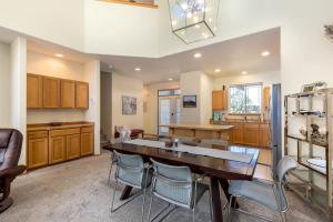 a large kitchen with a dining table and chairs at Spacious 4BR Private HOT TUB Eagle Crest Resort on Golf Course in Redmond