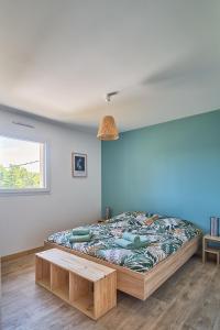 Ένα ή περισσότερα κρεβάτια σε δωμάτιο στο Charmante maison moderne à deux pas de la mer ! +33 φωτογραφίες