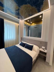 Postel nebo postele na pokoji v ubytování Shanti Rooms & Apartments Lucullo