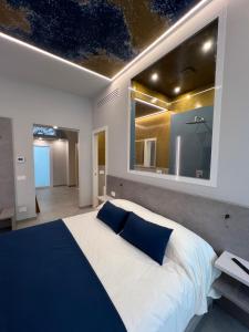 Postel nebo postele na pokoji v ubytování Shanti Rooms & Apartments Lucullo