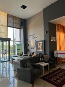 Posedenie v ubytovaní Athina Airport Hotel
