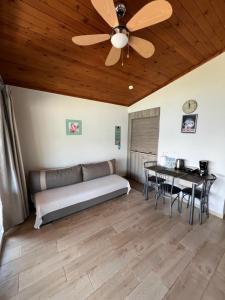 a living room with a couch and a table at Kallithea in Iraklitsa +71 photos