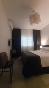 Postel nebo postele na pokoji v ubytování La Duchessa