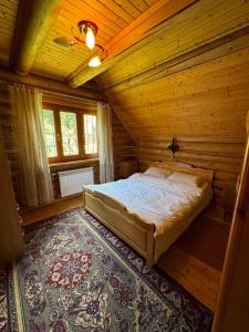 Postel nebo postele na pokoji v ubytování Ялинка
