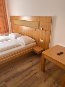 Postel nebo postele na pokoji v ubytování City Hotel Post 17