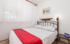 Postel nebo postele na pokoji v ubytování Holiday Home Starigrad Kod Senja, Obala Cr