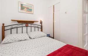 Postel nebo postele na pokoji v ubytování Holiday Home Starigrad Kod Senja, Obala Cr
