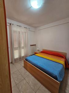 Llit o llits en una habitació de Appartamenti Bramante