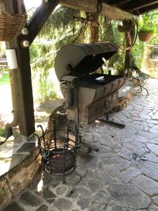 an outdoor grill sitting on a stone patio at Rotunda U Václava in Šebkovice