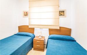 Posteľ alebo postele v izbe v ubytovaní Beautiful Apartment In Oropesa Del Mar