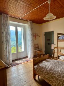 Postel nebo postele na pokoji v ubytování Casa Iolanda