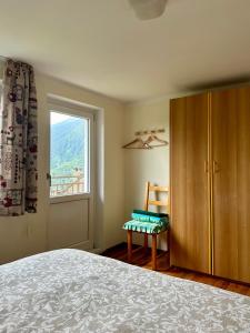 Postel nebo postele na pokoji v ubytování Casa Iolanda