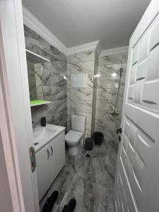 Koupelna v ubytování NOKTA SUITE APART + 12 fotografií