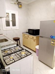 Kuchyň nebo kuchyňský kout v ubytování Gleem Bay Luxury Apartment