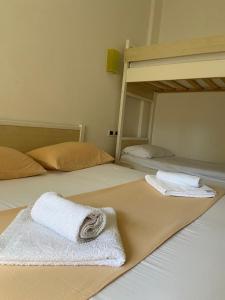 Postel nebo postele na pokoji v ubytování Hotel Prestige