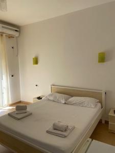 Postel nebo postele na pokoji v ubytování Hotel Prestige
