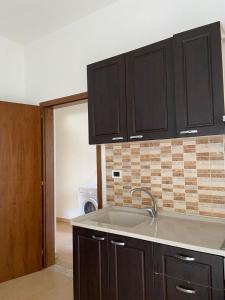 Kuchyň nebo kuchyňský kout v ubytování Hotel Prestige