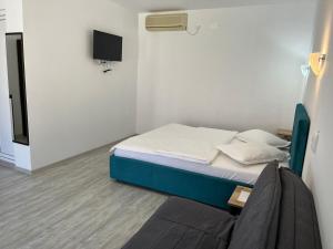 Postel nebo postele na pokoji v ubytování Vila Octopus