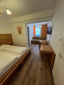 Postel nebo postele na pokoji v ubytování City Hotel Post 14