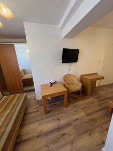 TV a/nebo společenská místnost v ubytování City Hotel Post 14