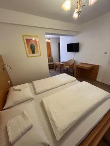 Postel nebo postele na pokoji v ubytování City Hotel Post 14