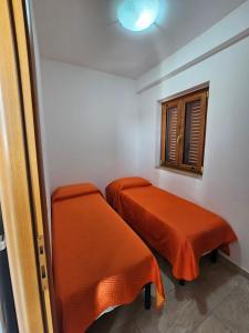 Llit o llits en una habitació de Appartamenti Bramante