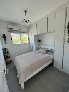 Ένα ή περισσότερα κρεβάτια σε δωμάτιο στο Пентхаус двух спальный с видом на море и горы в Татлысу