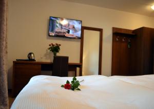 Letto o letti in una camera di Hotel U Kvapilů