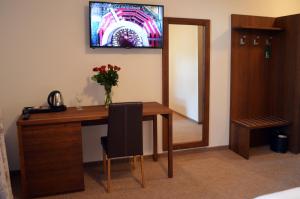 TV o dispositivi per l'intrattenimento presso Hotel U Kvapilů