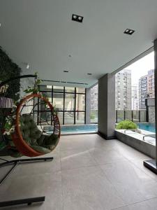 a large room with a largeiameteriameteriameteriameter at Flat 1609 Infinity Tower in Itapema +9 photos